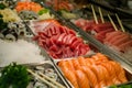 fresh seafood display with tuna, salmon, and eel for sushi Royalty Free Stock Photo