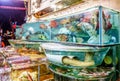 Fresh seafood market in Sai Kung, Hong Kong, full of different kinds of sea creatures for sale. Night view. Royalty Free Stock Photo