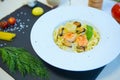 Fresh seafood pasta on black stone surface Royalty Free Stock Photo