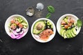 Fresh seafood recipe. Salmon gravlax poke bowl with fresh prawn, brown rice, cucumber, pickled sweet onion, radish, soy