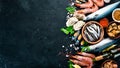 Fresh seafood on a stone background. Fish, shrimp, mussels, caviar. Royalty Free Stock Photo