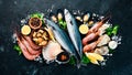 Fresh seafood on a stone background. Fish, shrimp, mussels, caviar. Royalty Free Stock Photo