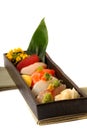 Fresh seafood sushi nigiri with lemon and flowers
