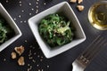 Fresh seaweed salad in a square bowl