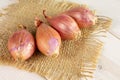 Fresh shallot on grey wood