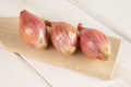 Fresh shallot on grey wood