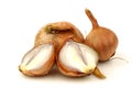 Fresh shallots and a cut one Royalty Free Stock Photo