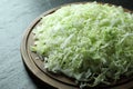 Fresh shredded cabbage on black table, closeup Royalty Free Stock Photo