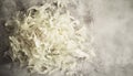 Fresh shredded cabbage on a light table, closed Royalty Free Stock Photo