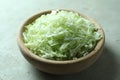 Fresh shredded cabbage on light table, closeup Royalty Free Stock Photo