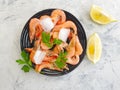 Fresh shrimp, ice, mediterranean delicious ingredient lemon on a gray concrete background Royalty Free Stock Photo