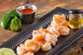 Fresh Shrimp Served On Black Plate On Wooden Table Cooked With H Royalty Free Stock Photo