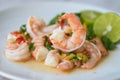 Fresh shrimp on white plate and fresh vegetables, cooked shrimps prawns and seafood spicy chili sauce coriander, cooking shrimp Royalty Free Stock Photo