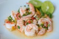 Fresh shrimp on white plate and fresh vegetables, cooked shrimps prawns and seafood spicy chili sauce coriander, cooking shrimp Royalty Free Stock Photo