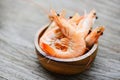 Fresh shrimp on wooden bowl - cooking seafood shrimps prawns Royalty Free Stock Photo