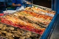 Fresh shrimps, crabs and seafood on ice at fish market stand Royalty Free Stock Photo