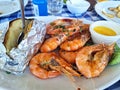 Fresh shrimps with jacket potatoes Royalty Free Stock Photo