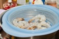 Fresh shrimps in plastic bowl, ready for cooking Royalty Free Stock Photo