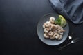 Fresh shrimps in plate over dark background. Healthy food. Top view. Copy space Royalty Free Stock Photo