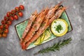 fresh shrimps and tomato wedges served with a lemon sauce