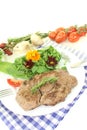 Fresh Sirloin steak with wild herb salad Royalty Free Stock Photo