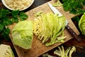 Fresh Slice of Cabbage on wooden chopping board. healthy food Royalty Free Stock Photo