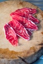 Fresh sliced beef hind shank on chopping board