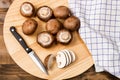 Fresh and sliced chestnut mushroom on a wooden board Royalty Free Stock Photo