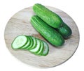 Fresh sliced cucumber on board isolated Royalty Free Stock Photo