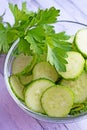 Fresh sliced cucumbers in a glass plate. Royalty Free Stock Photo