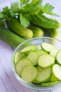 Fresh sliced cucumbers in a glass plate. Royalty Free Stock Photo