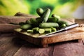 Fresh and sliced cucumbers. Sliced cucumbers on a cutting board. Royalty Free Stock Photo