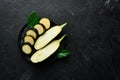 Fresh sliced eggplant on black background. Vegetables.