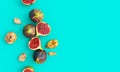 Fresh sliced figs on turquoise blue background