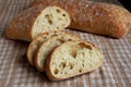 Fresh sliced italian Ciabatta bread on background Royalty Free Stock Photo