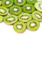 Fresh sliced kiwi fruit on white background. Space for text Royalty Free Stock Photo