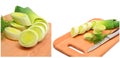 Fresh sliced leeks and dill on a wooden board Royalty Free Stock Photo