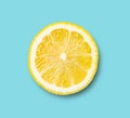 Fresh sliced lemon  poster on blue background. Top view, copy space and macro. Concept healthy and vegan image Royalty Free Stock Photo