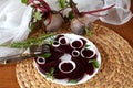 Fresh sliced organic beetroot with onion decorated on a white plate Royalty Free Stock Photo