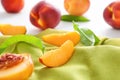 Fresh sliced peach on napkin, closeup Royalty Free Stock Photo