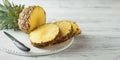 Fresh sliced pineapple on a cutting board Royalty Free Stock Photo