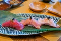 Fresh sliced raw tuna or otoro, chutoro and akami sushi sashimi served with pickled wasabi. Japanese traditional food. Royalty Free Stock Photo