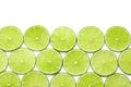 Fresh sliced ripe limes on white background , top view Royalty Free Stock Photo