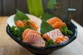 Fresh sliced salmon or salmon sashimi with salmon ikura or salmon egg in bowl set on table, Japanese food Royalty Free Stock Photo