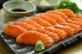 Fresh Sliced Salmon Sashimi Platter with Soy Sauce and Wasabi on a Wooden Table Japanese Cuisine Concept Royalty Free Stock Photo