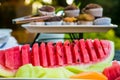 Fresh sliced watermellon at a spring festival picnic Royalty Free Stock Photo