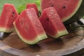 Fresh sliced watermelon wooden background Royalty Free Stock Photo