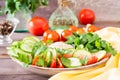 Fresh slices of cucumbers, tomatoes and parsley leaves Royalty Free Stock Photo