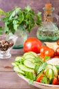 Fresh slices of cucumbers, tomatoes and parsley leaves Royalty Free Stock Photo