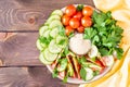 Fresh slices of cucumbers, tomatoes, sesame seeds in a bowl Royalty Free Stock Photo